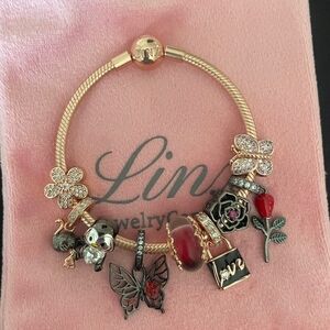 Linx Rose Gold Snake Chain Bracelet with Black Themed Charms